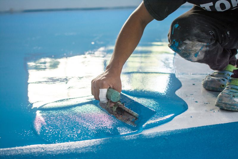 epoxy floor mixture spread on floor