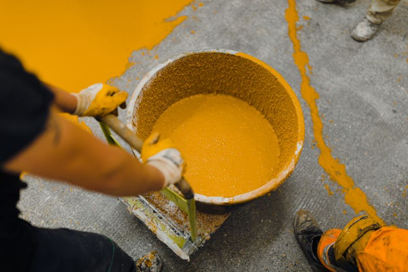 Epoxy floor mixture being prepared before application