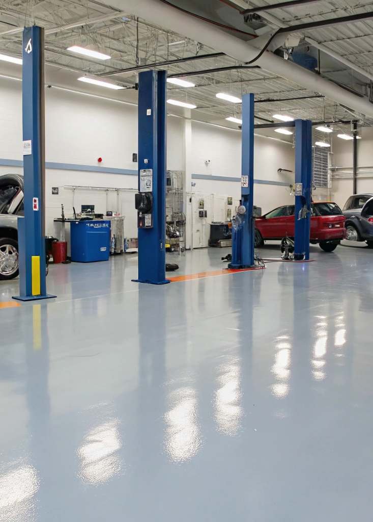 Professional automotive repair shop interior with epoxy flooring